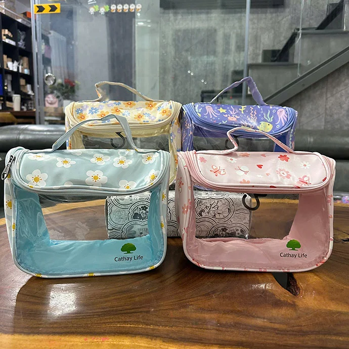 TÚI ĐỰNG MỸ PHẨM PVC CÓ HỌA TIẾT IN LOGO THEO YÊU CẦU